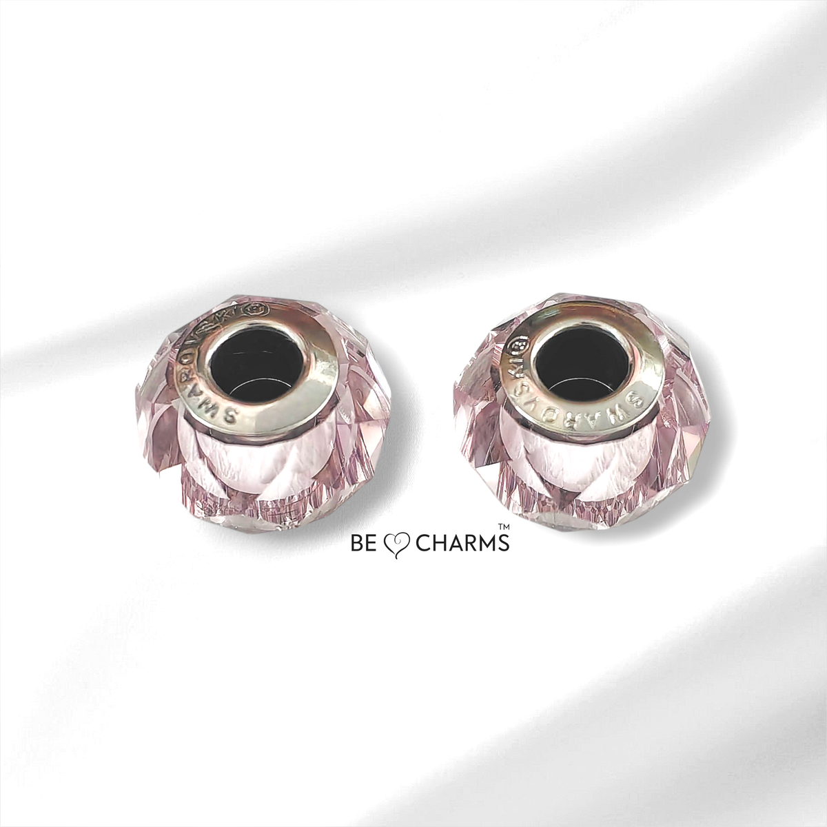 Par de charms swarovski amatista claro facetado redondo