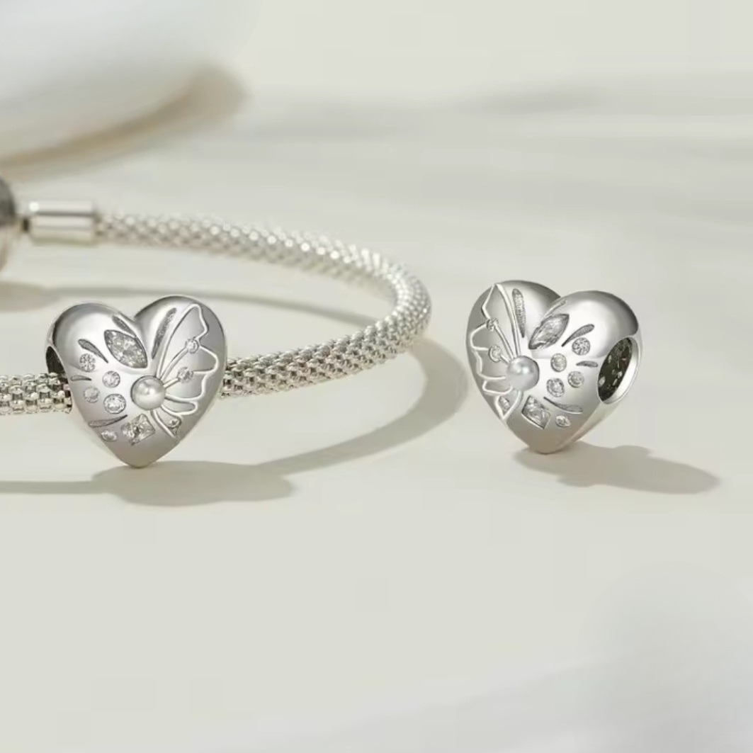 Charm majestuoso corazon con perla