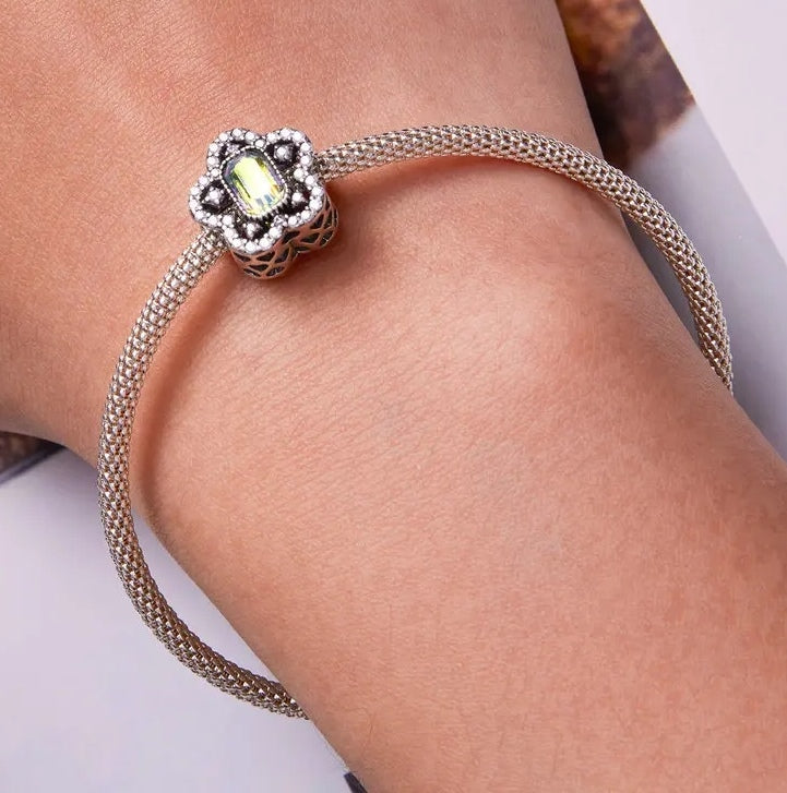 Charm fijo flor pavé con cristal tornasol
