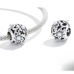Charm flores y perlas