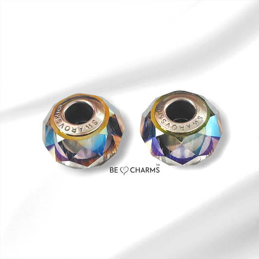 Par de charms swarovski ahumado tornasol facetado redondo