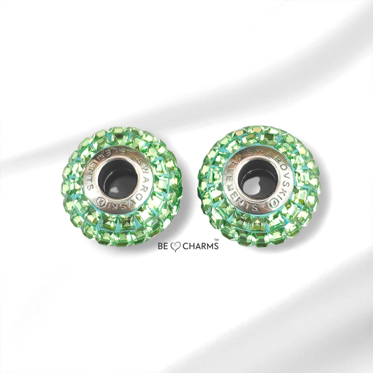 Par de charms swarovski peridoto corte esmeralda redondo