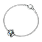 Charm fijo flor pavé con cristal tornasol