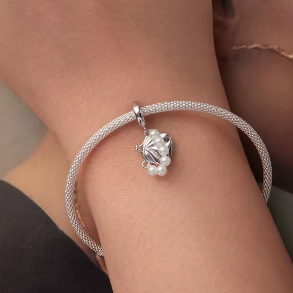 Charm colgante bolsa con tira de perlas