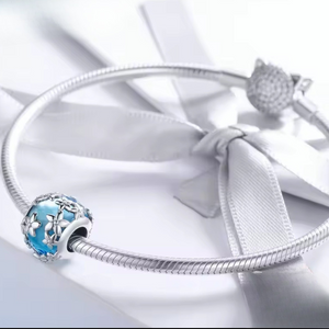 Charm flores en azul