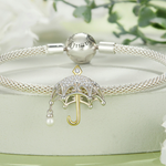 Charm hermosa sombrilla con perla y pavés