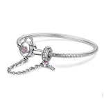 Brazalete serpiente candado corazón zirconias y llave